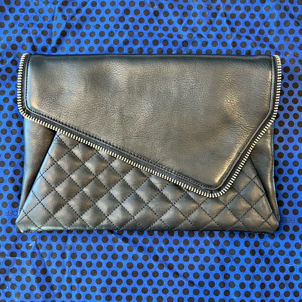 Beautiful Leather clutch purchased at Nordstrom. Never worn!
